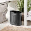 MDesign Oval Slim Steel Small Trash Can Wastebasket